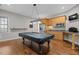 Game room with pool table and kitchenette at 244 Mantle Dr, Clayton, NC 27527