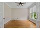 Cozy office with hardwood floors, crown molding, and a large window for natural light at 244 Mantle Dr, Clayton, NC 27527