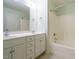 Bathroom featuring a double sink vanity and a shower-tub combo at 253 Middle Landing Dr, Smithfield, NC 27577