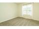 Modest bedroom with carpet, neutral walls, and one window at 253 Middle Landing Dr, Smithfield, NC 27577