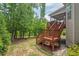 Deck with stairs overlooking the backyard is perfect for outdoor gatherings at 2633 Beckwith Rd, Apex, NC 27523
