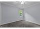 Cozy bedroom with carpet, neutral walls, and natural light at 2705 Kempsford Pl, Raleigh, NC 27604