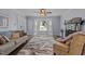 Inviting living room with large bay window, fireplace, and modern furnishings at 2705 Kempsford Pl, Raleigh, NC 27604
