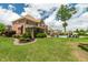 Brick home with a beautiful backyard featuring a screened porch, pergola, and a sparkling pool at 2912 Turning Brook Ln, Raleigh, NC 27616