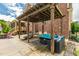 Covered back patio featuring lounge furniture, pergola, and pool at 2912 Turning Brook Ln, Raleigh, NC 27616
