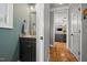 Powder room features modern fixtures and a neutral color palette at 2912 Turning Brook Ln, Raleigh, NC 27616