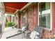 Covered front porch featuring seating area at 2912 Turning Brook Ln, Raleigh, NC 27616