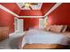 Spacious main bedroom suite featuring tray ceiling, carpet and ensuite bathroom access at 2912 Turning Brook Ln, Raleigh, NC 27616