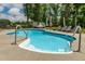In-ground pool featuring tanning deck and landscaping at 2912 Turning Brook Ln, Raleigh, NC 27616