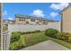 Inviting backyard with manicured lawn, white fence, and lush landscaping for outdoor relaxation at 303 Leighann Ridge Ln, Rolesville, NC 27571
