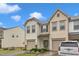 Inviting townhome with attached garage and well-maintained landscaping at 303 Leighann Ridge Ln, Rolesville, NC 27571