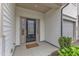 Welcoming front entryway with sidelights and manicured greenery at 303 Leighann Ridge Ln, Rolesville, NC 27571