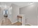 Upstairs hallway with wood floors and a view into the living area at 303 Leighann Ridge Ln, Rolesville, NC 27571