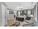 Spacious main bedroom with hardwood floors, sitting area, ensuite bathroom, and soft, neutral decor at 303 Leighann Ridge Ln, Rolesville, NC 27571