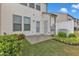 Backyard patio with lawn, plantings and exterior access at 303 Leighann Ridge Ln, Rolesville, NC 27571