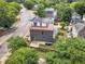 Modern home in a suburban neighborhood with solar panels, fenced yard, and patio at 304 S Tarboro St, Raleigh, NC 27610