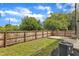 Fenced backyard with green grass and a concrete patio for outdoor living and entertaining at 304 S Tarboro St, Raleigh, NC 27610