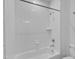 Clean bathroom features a shower/tub combo with white subway tile and modern fixtures at 304 S Tarboro St, Raleigh, NC 27610