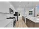 Modern kitchen with stainless appliances and large island at 304 S Tarboro St, Raleigh, NC 27610