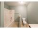Bathroom featuring a white tub-shower combo and a neutral-colored vanity at 306 Plank Bridge Way, Morrisville, NC 27560