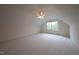 Bright, carpeted bedroom with a ceiling fan and a single window at 306 Plank Bridge Way, Morrisville, NC 27560