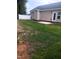 Spacious backyard with a patio and privacy fence at 31 Kevior Ave, Four Oaks, NC 27524