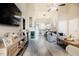 Open concept living room with vaulted ceilings and wood flooring at 318 Tillamook Dr, Wake Forest, NC 27587