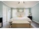 Cozy main bedroom with neutral paint, decorative rug and lots of natural light at 318 Tillamook Dr, Wake Forest, NC 27587