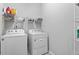 Laundry room with a side-by-side washer and dryer at 320 Everly Mist Way, Wake Forest, NC 27587
