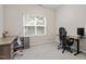 Bright office space featuring two desks and a window providing natural light at 320 Everly Mist Way, Wake Forest, NC 27587