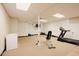 Basement featuring carpet flooring with gym equipment including a bench and a treadmill at 3911 Morvan Way, Raleigh, NC 27612