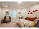 Cheerful bedroom with bright decor, a comfortable bed, and ample natural light at 3911 Morvan Way, Raleigh, NC 27612