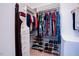 Walk-in closet featuring shelving, shoe racks and hanging rods to maximize storage space for your wardrobe at 3911 Morvan Way, Raleigh, NC 27612
