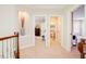 Hallway with a view of a bathroom, bedroom and a living space with carpet flooring at 3911 Morvan Way, Raleigh, NC 27612