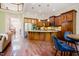 Kitchen with stainless steel appliances, granite countertops, hardwood floors and ample cabinet space at 3911 Morvan Way, Raleigh, NC 27612