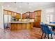 Spacious kitchen featuring granite countertops, stainless steel appliances, and center island at 3911 Morvan Way, Raleigh, NC 27612