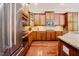 Kitchen with stainless steel appliances, granite countertops and hardwood floors at 3911 Morvan Way, Raleigh, NC 27612