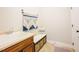 Mud room with sink, storage baskets and wall decor at 3911 Morvan Way, Raleigh, NC 27612