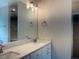 Bathroom with vanity featuring double sinks, granite countertops, and a modern faucet at 4001 Newby Rd, Rocky Mount, NC 27804