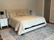 Serene bedroom with a plush bed, nightstands, and stylish area rug at 4001 Newby Rd, Rocky Mount, NC 27804
