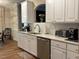 Modern kitchen with white cabinets, stainless steel appliances, and marble countertops at 4001 Newby Rd, Rocky Mount, NC 27804