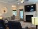 Comfortable living room showcases fireplace, large TV, rug, and furniture at 4001 Newby Rd, Rocky Mount, NC 27804