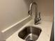 Close-up of a modern sink with elegant chrome faucet and marbled countertop at 4001 Newby Rd, Rocky Mount, NC 27804