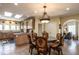 Eat-in kitchen with a breakfast table, granite countertops, and stainless steel appliances at 4038 Carpenter Pond Rd, Durham, NC 27703