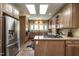 Well-equipped kitchen with stainless steel appliances, granite countertops, and ample cabinet space at 4038 Carpenter Pond Rd, Durham, NC 27703