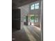 Bright foyer featuring double doors, transom window, and abundant natural light at 4248 Jacks Creek Trl, Burlington, NC 27215