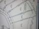 Plat map of the property lines showing the location of the home on the lot at 4248 Jacks Creek Trl, Burlington, NC 27215