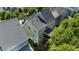 Aerial view showcasing the house with a screened porch and landscaped backyard at 436 Edgepine Dr, Holly Springs, NC 27540