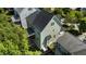 Aerial view of a home with a screened porch and well-maintained backyard at 436 Edgepine Dr, Holly Springs, NC 27540