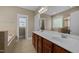 Elegant bathroom with double sinks, and separate tub and shower at 436 Edgepine Dr, Holly Springs, NC 27540